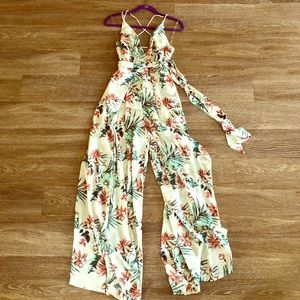 Ivory floral print jumpsuit w/ plunging neckline